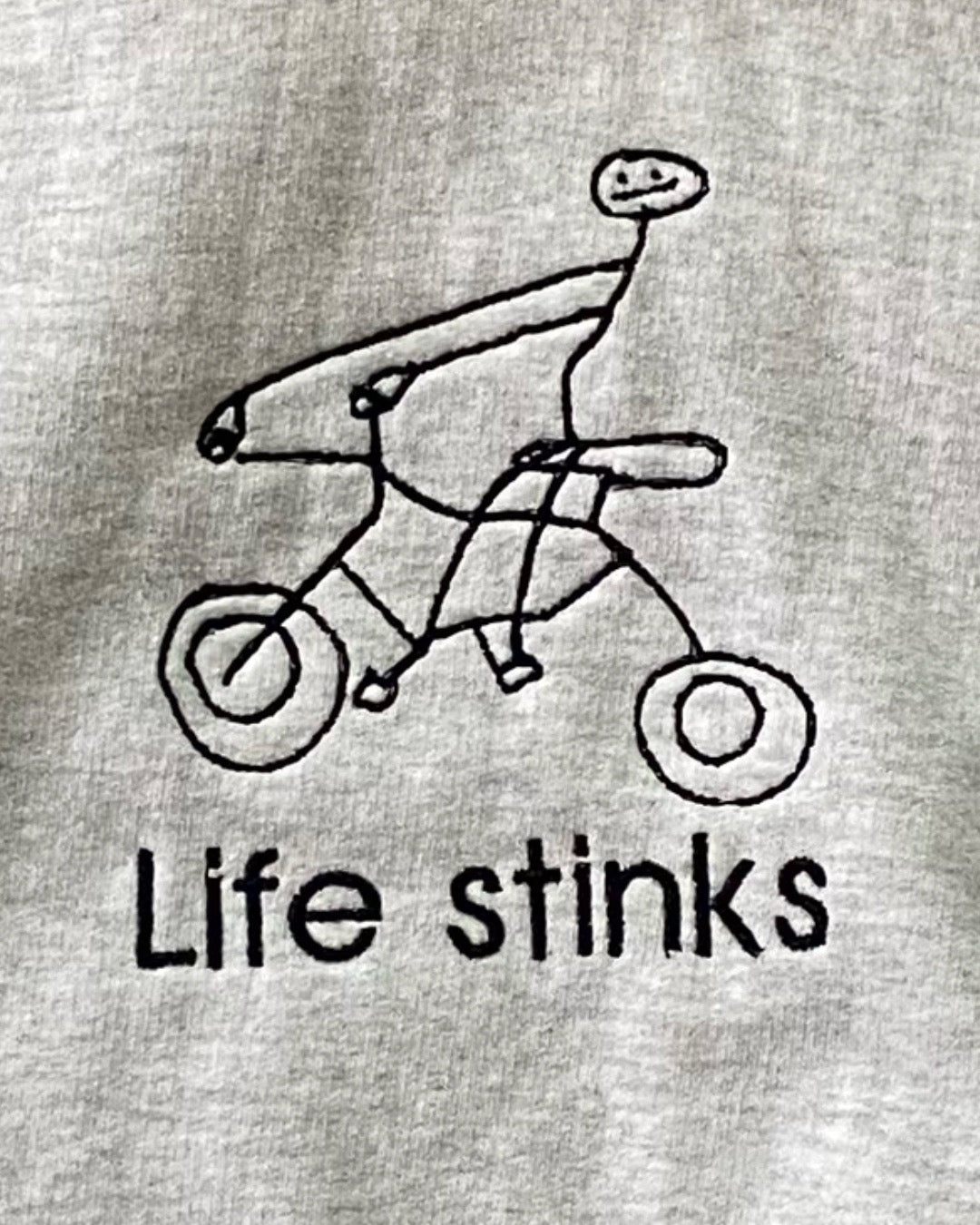 LIFE STINKS HOODIE