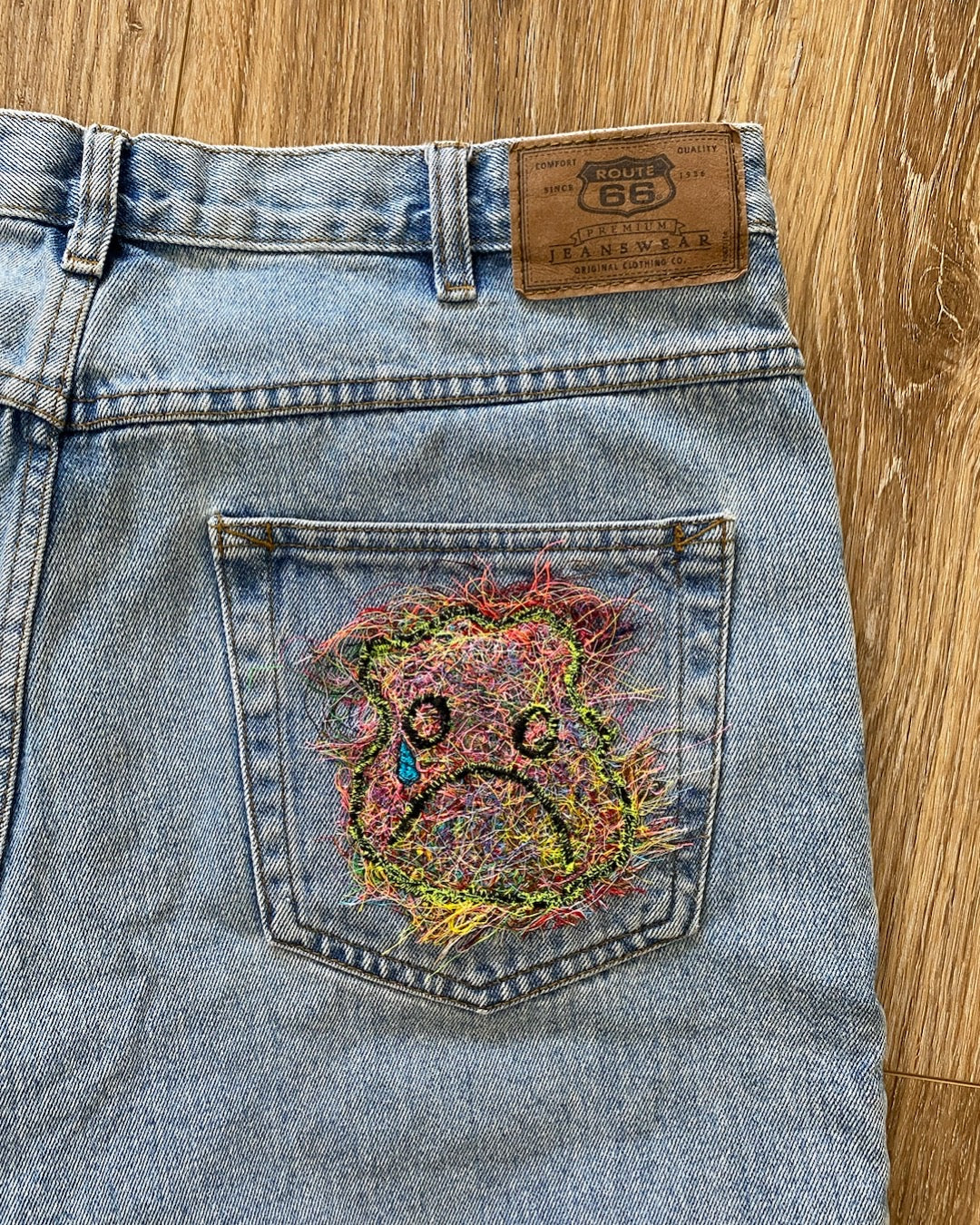 RECYCLED SCRAP THREAD SAD MONSTER SHORTS
