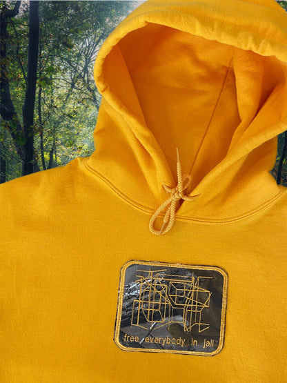 FREE EVERYBODY IN JAIL CAMO PATCH HOODIE